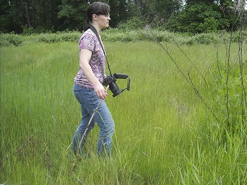 Lynette Schimming in large grassy field, Puyallup Riverwalk Trail, Pierce County, Washington