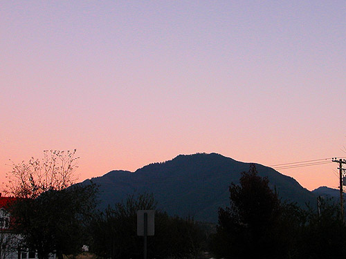 dusk glow behind hill across valley from Ashford County Park, Ashford, Pierce County, Washington