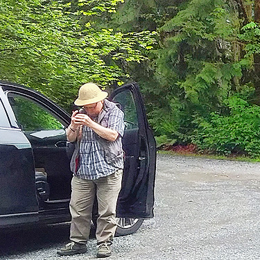 Rod Crawford examines a specimen, South Fork Canyon Creek at FS Road 41, Snohomish County, Washington