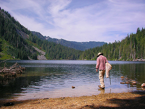 Jerry Austin on shore of Lake Dorothy, Alpine Lakes, King County, Washington