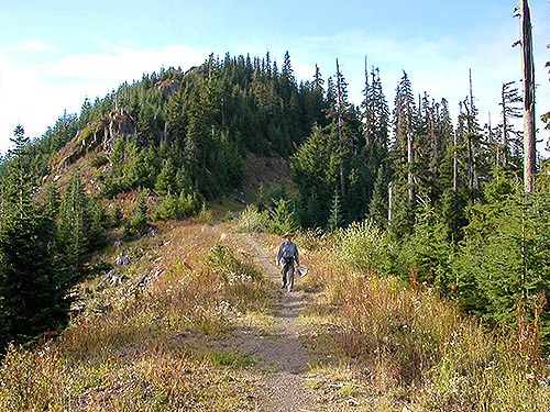 Laurel Ramseyer heading out from 4600' summit ridge of Huckleberry Mountain, SE corner King County, Washington