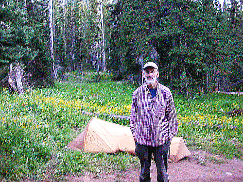 Jerry Austin, tent and flower meadow at dusk, Deer Park Campground, Slate Creek, Whatcom County, Washington