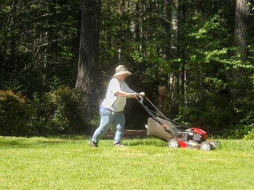 Lu Winsor doing volunteer maintenance, Rocky Creek Conservation Area, Key Peninsula, Pierce County, Washington