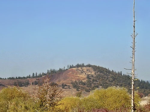 Blockhouse Butte with red cinder quarry, central Klickitat County, Washington