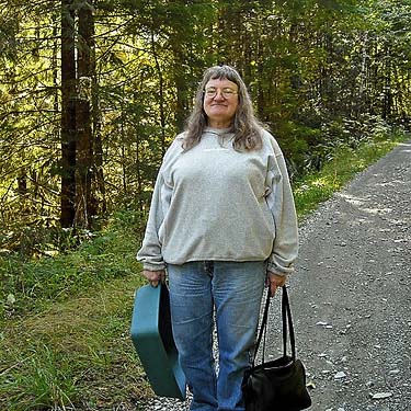 Della Scott prepares to assist the spider collector, Frog Lake, Snohomish County, Washington