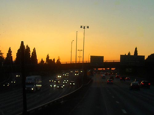 sunset through a bus window entering Seattle, Washington on 2 June 2013