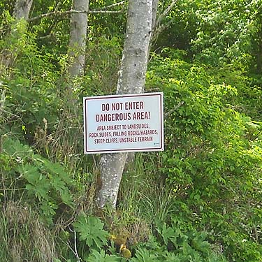 foolish warning sign, beach at West Twin River, Clallam County, Washington