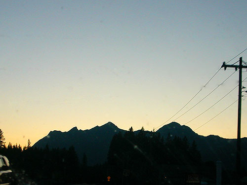 sunset afterglow from highway west of Darrington, Washington on 1 August 2023