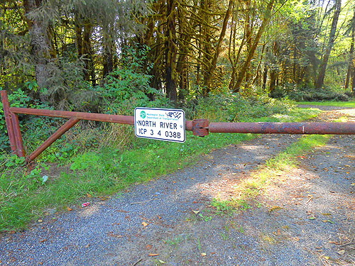 entry gate to field site, S side North River south of Artic, Washington
