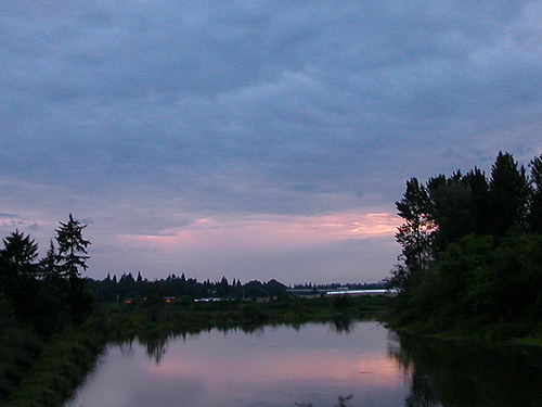 quasi-sunset from Highway 2 causeway east of Everett, Washington on 15 June 2022