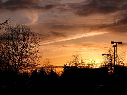 sunset from a gas station along I-5 in Pierce County, Washington, 25 March 2022