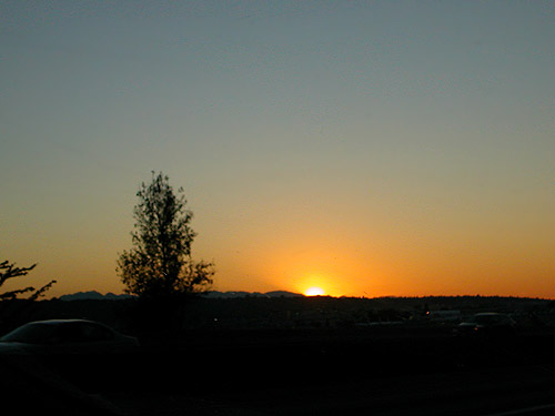sun setting from south Seattle, 25 June 2021