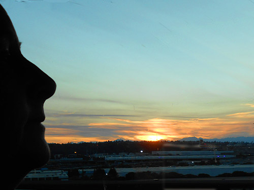 King County, WA sunset on 25 August 2026 with Kathy Whaley's silhouette