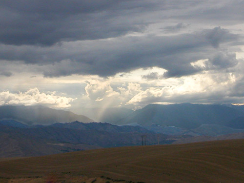 stormy weather in distance, Badger Mountain Road, East Wenatchee, Washington