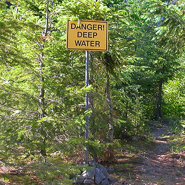 warning sign at Heli's Pond, Gold Creek Valley near Snoqualmie Pass, Washington