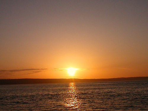 sun setting behind Kingston-Edmonds ferry, 27 May 2023