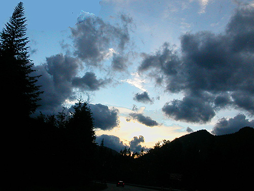 sunset from highway approaching Stevens Pass from east, 9 July 2022