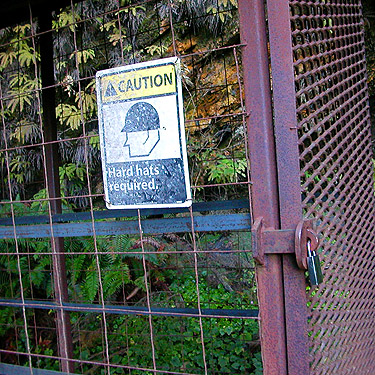 sign at falls bridge about hardhats, Gilligan Creek Falls, Skagit County, Washington