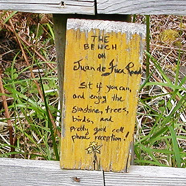 sign on public bench, Jacob Miller Road, north central Quimper Peninsula, Jefferson County, Washington