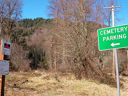 contradictory signs at parking area, Rainey Valley Cemetery, Lewis County, Washington