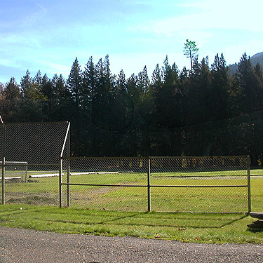 fence and backstop, Skykomish Ballpark, Skykomish, King County, Washington