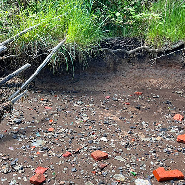 bricks on beach, coastal strip at Stafford Creek mouth, Grays Harbor, Washington