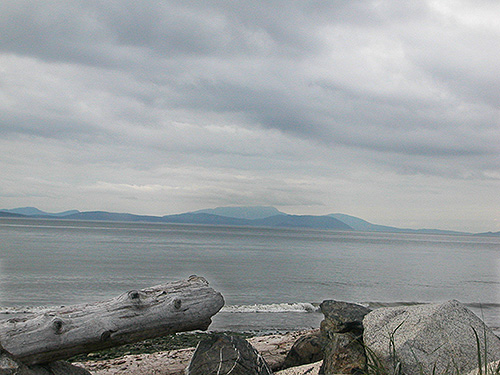 San Juan Island and Vancouver Isand seen from beach, north of Swantown Lake, Whidbey Island, Washington