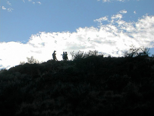 hikers silhouetted above us, Cowiche Canyon Trail, Yakima County, Washington