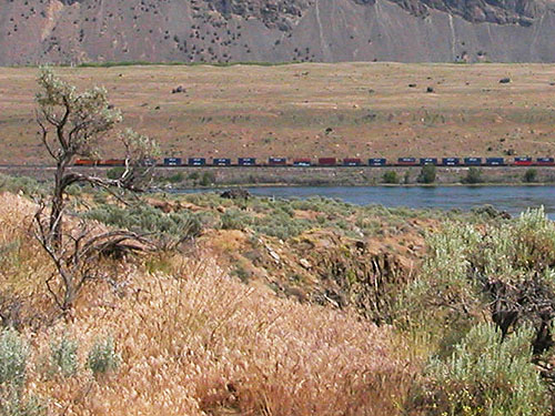 train seen across river from Dry Gulch, SE Chelan County, Washington