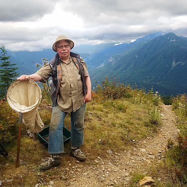 Rod Crawford poses along trail to Evergreen Mountain, Shohomish County, Washington