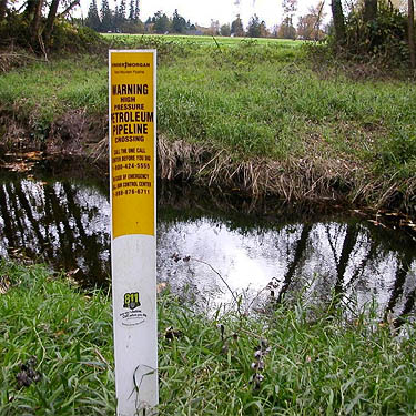 pipeline warning by Breckenridge Creek near Nooksack Cemetery, NE of Everson, Whatcom County, Washington