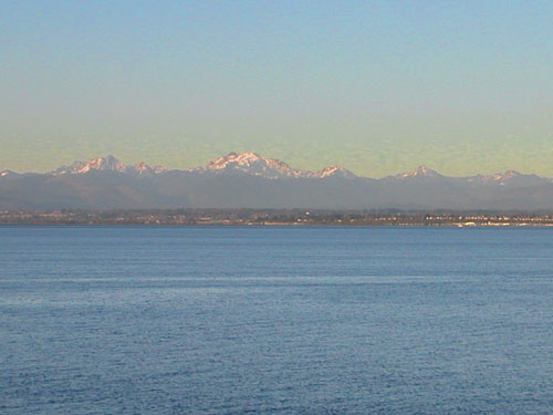 northern Cascades seen from a ferry at Clinton Ferry Terminal, Whidbey Island, Washington
