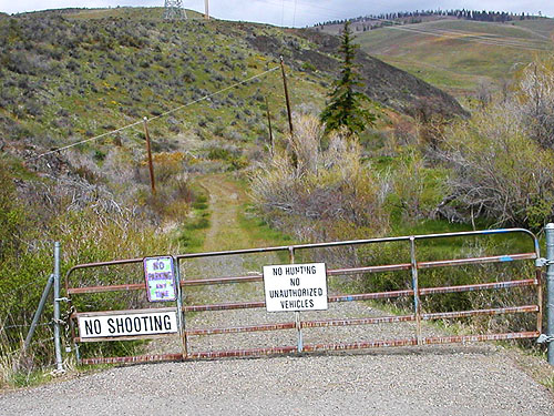 gate to Ellensburg city property, Naneum Creek (at Naneum Road bridge), Kittitas County, Washington