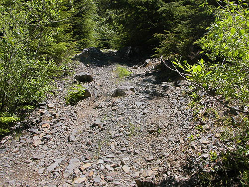 very rough circum-quarry road, rock quarries NW side of Mt Pilchuck, Snohomish County, Washington