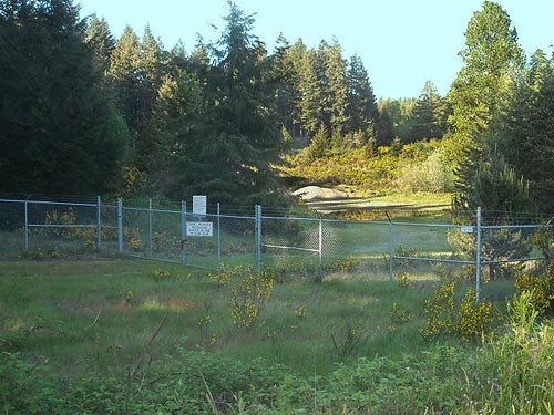 Foolish high security gate to county gravel pit, Rocky Creek Conservation Area, Key Peninsula, Pierce County, Washington