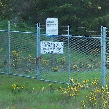 Sign at gate to county gravel pit, Rocky Creek Conservation Area, Key Peninsula, Pierce County, Washington