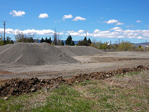 gravel pile in county field, Thorp Highway Bridge, near Ellensburg, Kittitas County, Washington