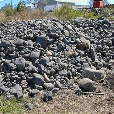 rockpile in county field, Thorp Highway Bridge, near Ellensburg, Kittitas County, Washington