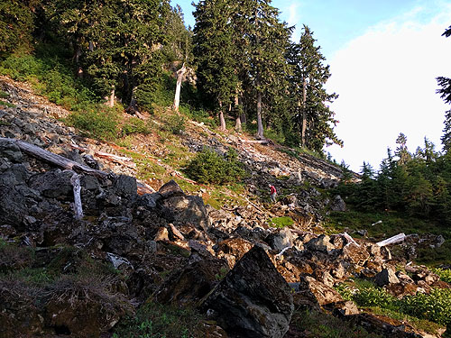 Jerry Austin in boulder talus, Anderson Lake-Watson Lakes Trail junction, south central Whatcom County, Washington