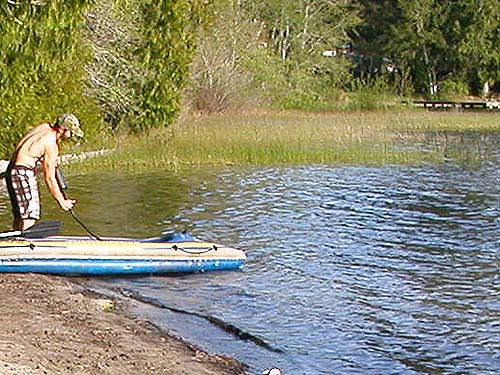 kayaker and marsh at N end of Lake Nahwatzel, Mason County, Washingtom